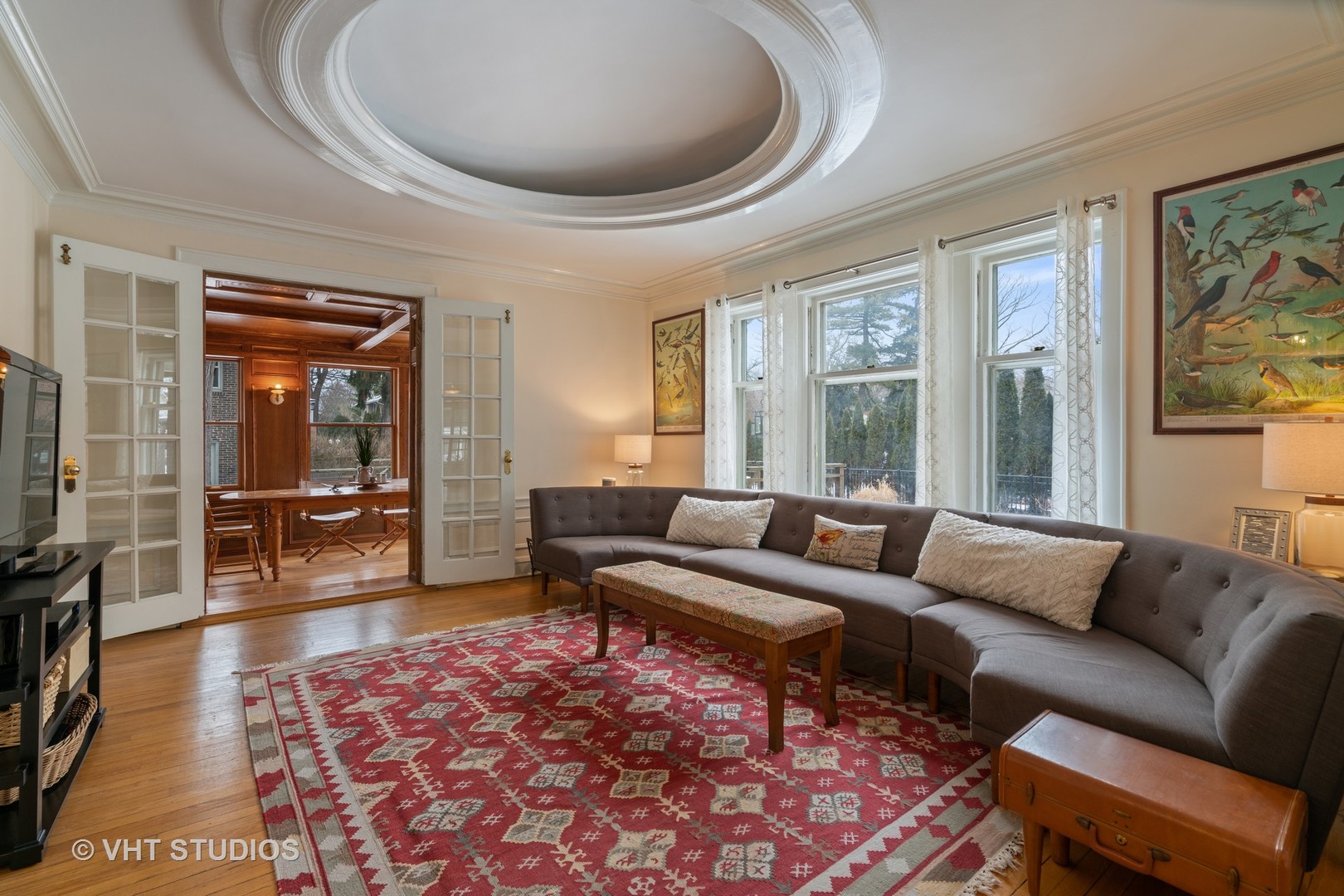 610 Forest Avenue Wilmette, IL 60091 - Photo 8 of 50 a living room with furniture and a large window
