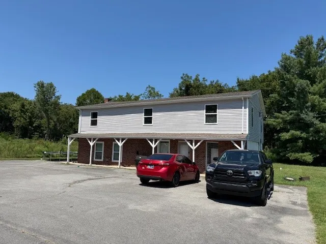 a car parked in front of a house