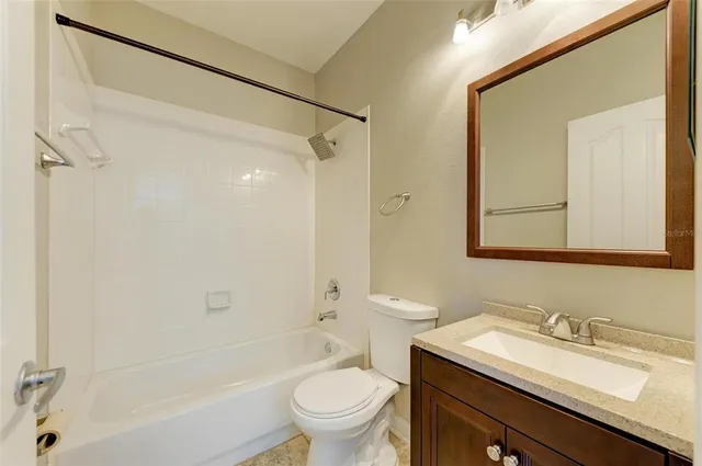 a view of a lake with a big yard