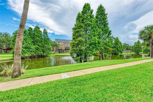 a view of a lake with a yard