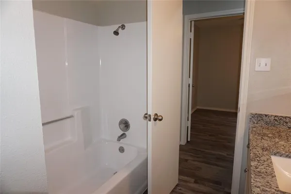 a bathroom with a bathtub