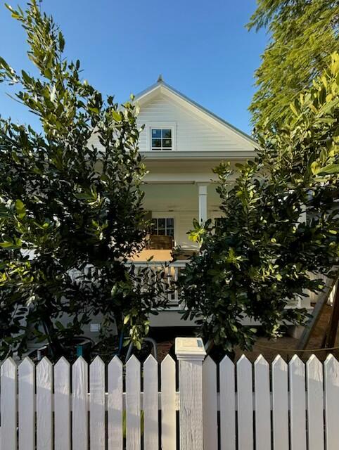 1315 Newton Street Key West, FL 33040 - Photo 2 of 4 a front view of a house with a garden