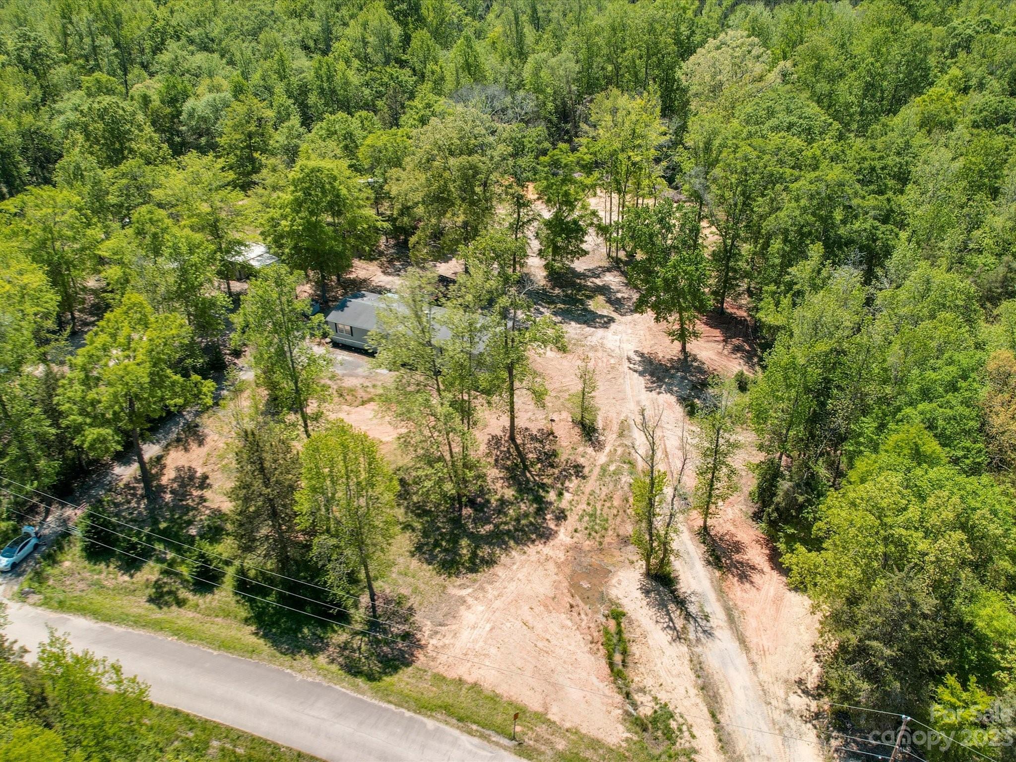 4034 Berry Hill Road Edgemoor, SC 29712 - Photo 30 of 31 a view of a forest with houses