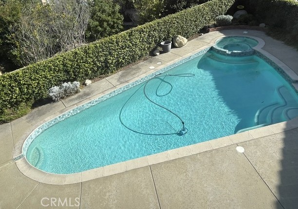 6369 Chandon Place Rancho Cucamonga, CA 91737 - Photo 3 of 4 Saltwater pool and spa, private back yard.