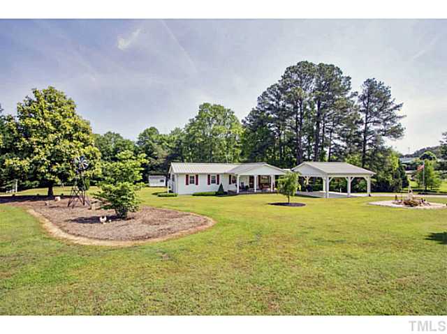 6637 Ten-Ten Road Apex, NC 27539 - Photo 24 of 25 The yard is nicely landscaped!