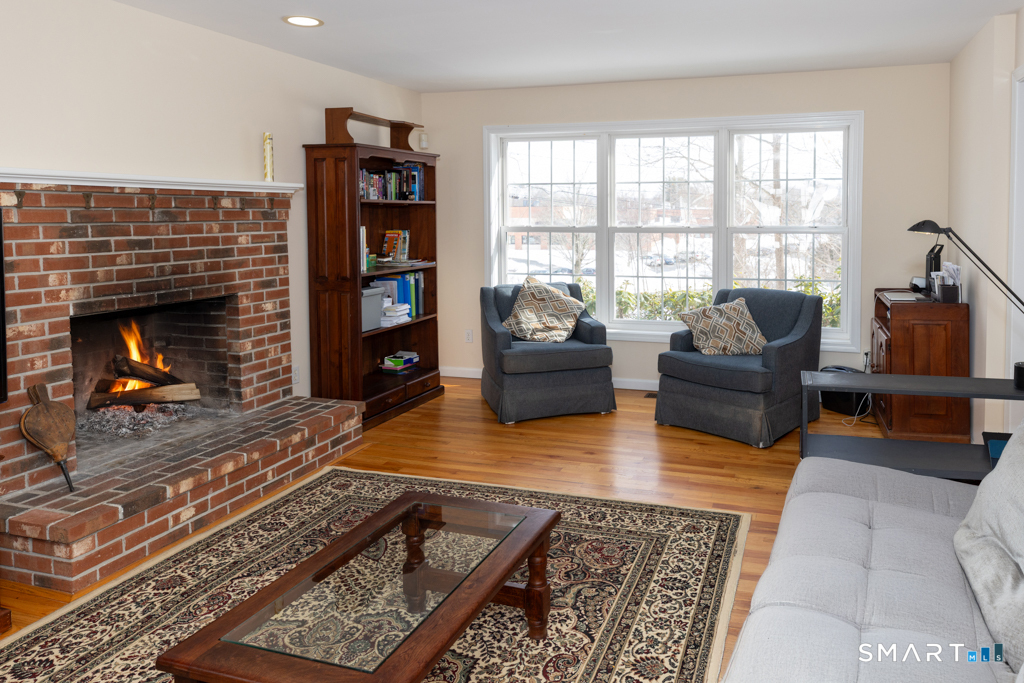85 McVeagh Road Westbrook, CT 06498 - Photo 10 of 40 with a pretty brick fireplace
