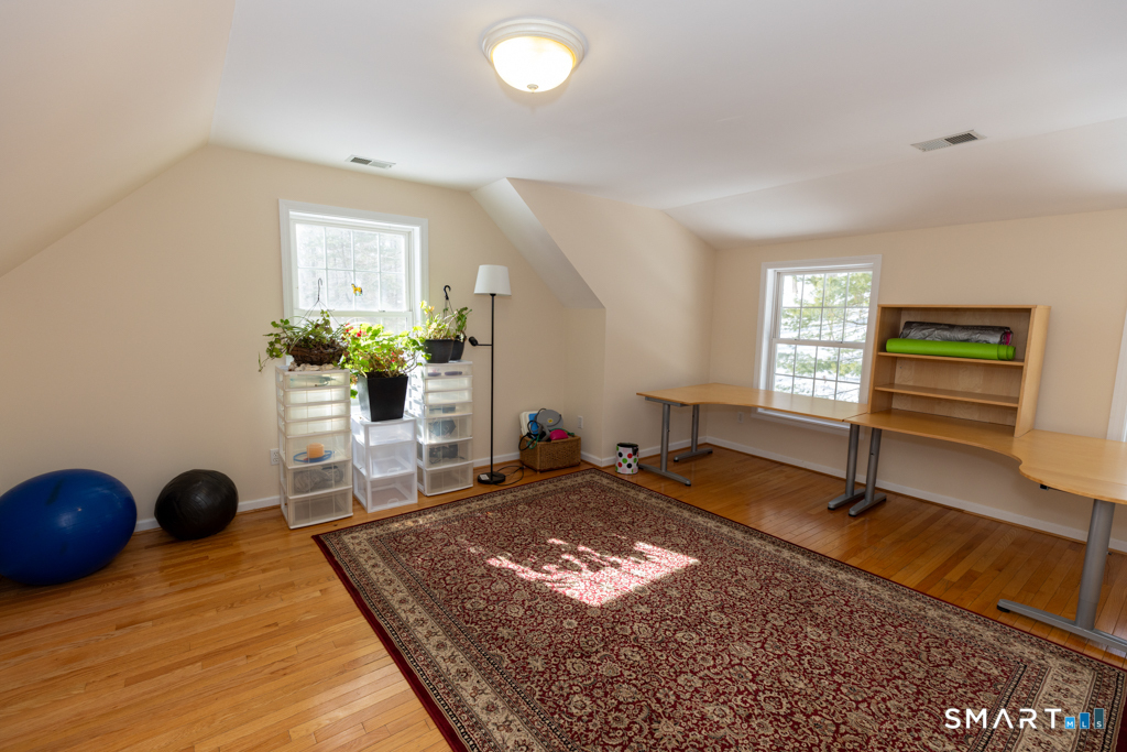 85 McVeagh Road Westbrook, CT 06498 - Photo 31 of 39 a bedroom with a bed and window