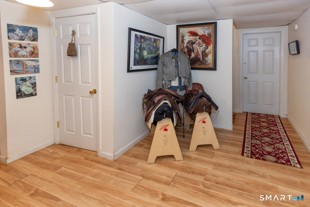 85 McVeagh Road Westbrook, CT 06498 - Photo 34 of 39 a view of front door with wooden floor