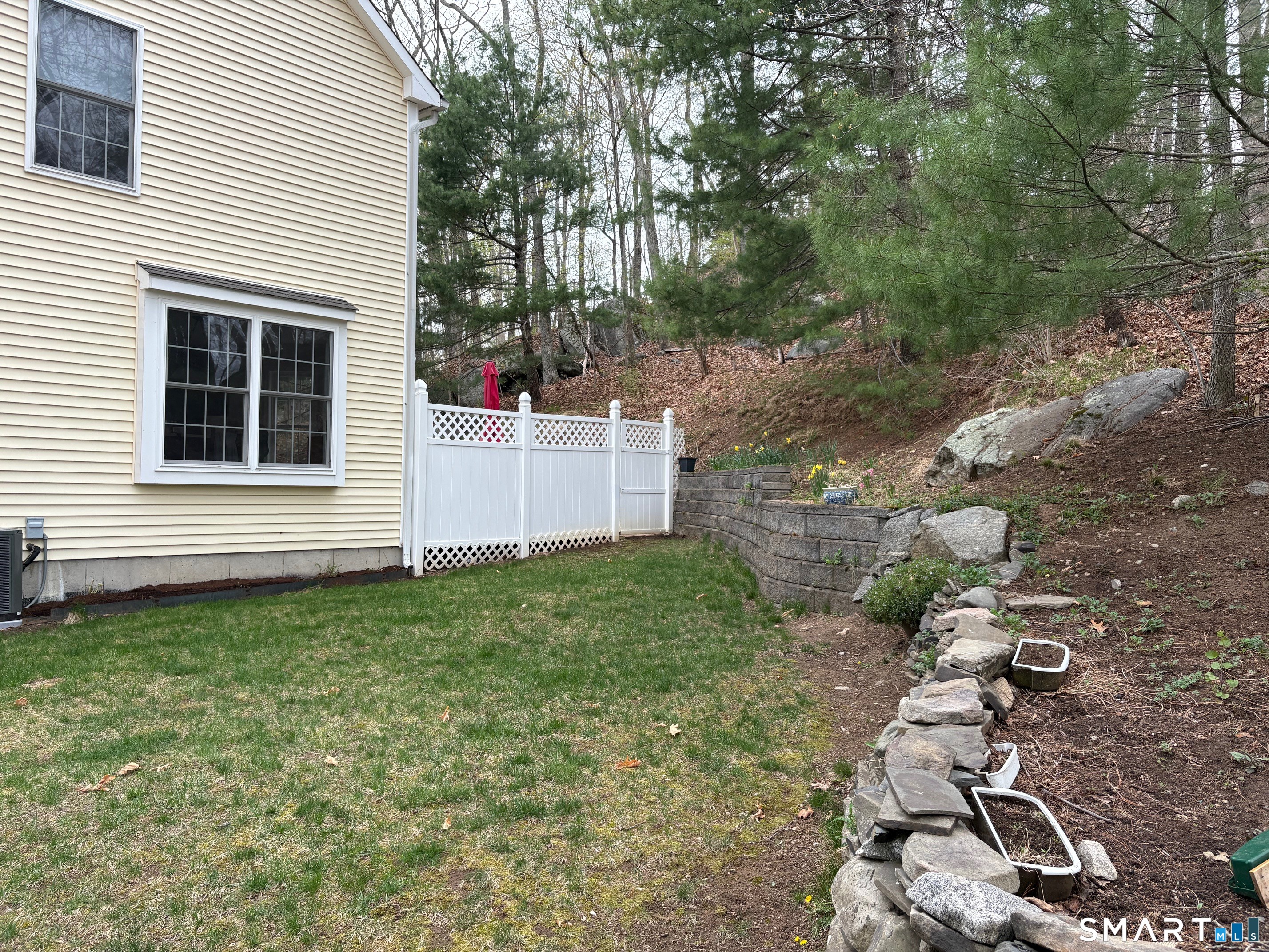 85 McVeagh Road Westbrook, CT 06498 - Photo 35 of 40 The property is enhanced by lovely stonewalls - a pretty side yard . ..