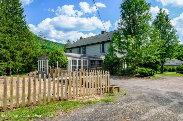 a house view with a garden space
