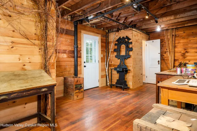 a house view with a sitting space and garden space