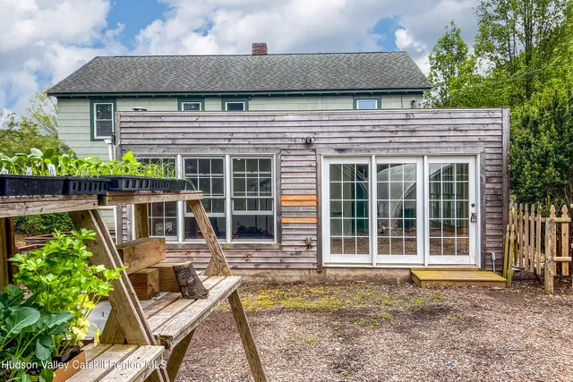 a view of balcony with wooden stairs