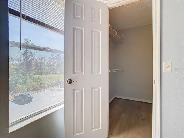 a view of a bathroom with a glass door