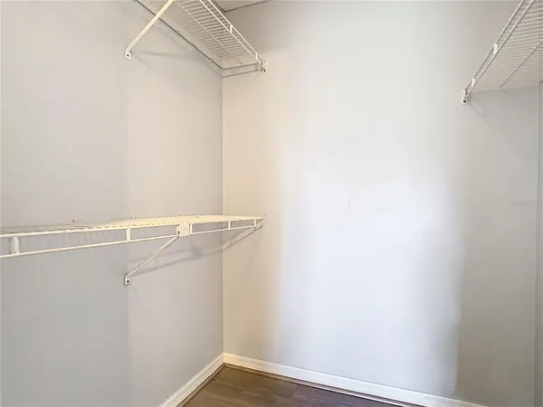 a view of a room with racks on the wall