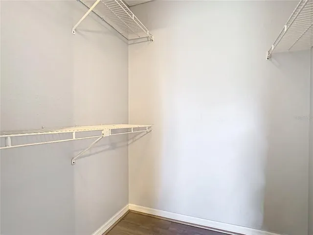 a view of a room with racks on the wall