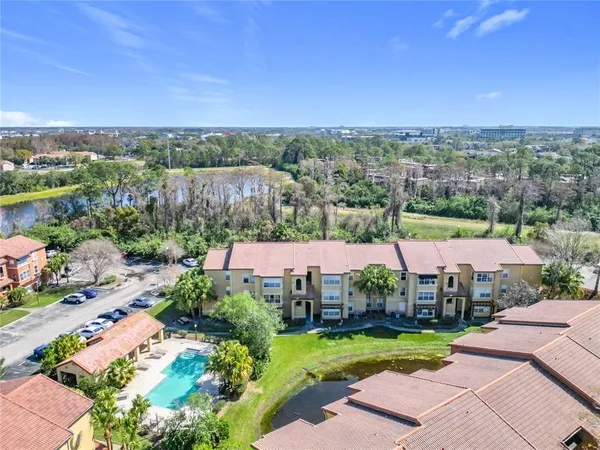 an aerial view of a house with a garden
