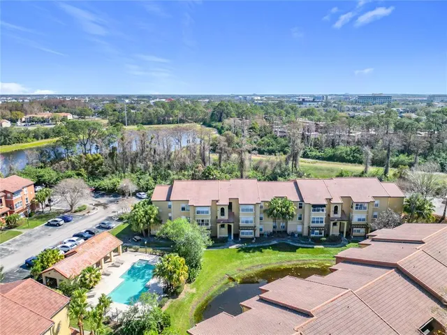 an aerial view of a house with a garden