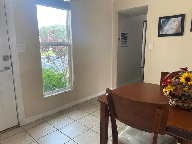 a workspace with furniture and window