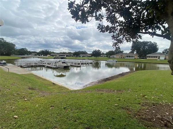 a view of a lake with outdoor space
