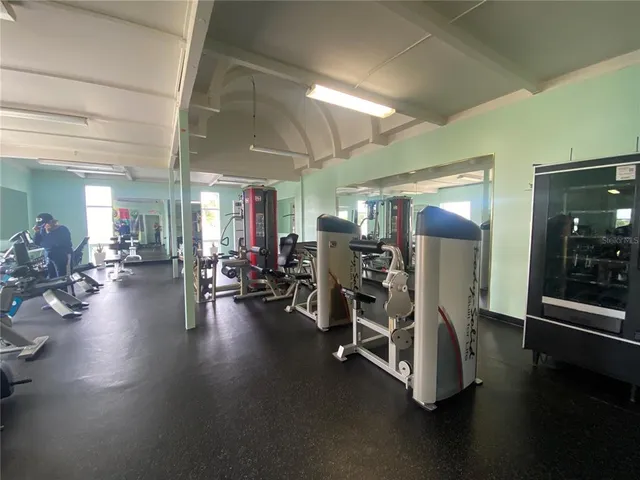 a view of kitchen with furniture and a table