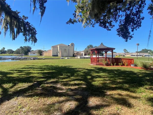 a view of an outdoor sitting area with furniture