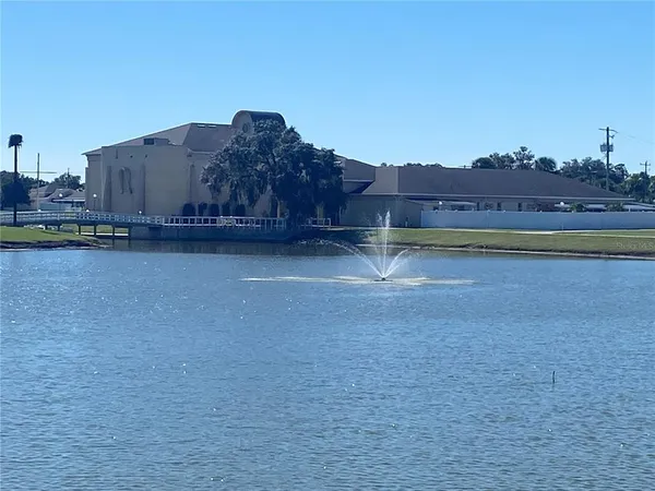 a view of an outdoor space and tennis court