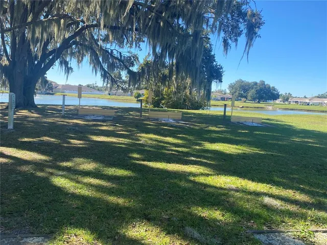 a view of a lake with outdoor space