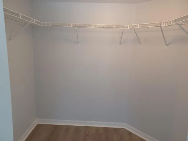 a view of a room with racks on the wall