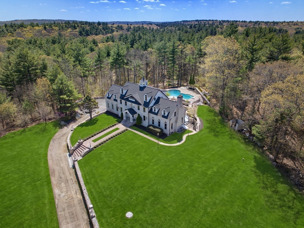 175 Pleasant Street Upton, MA 01568 - Photo 37 of 39 an aerial view of a house with a big yard
