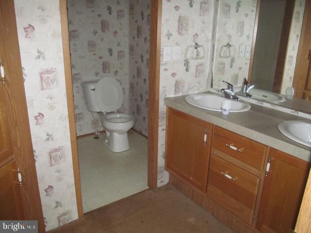 2620 Roberts Station Road Henderson, MD 21640 - Photo 8 of 12 Hall bathroom with double vanity