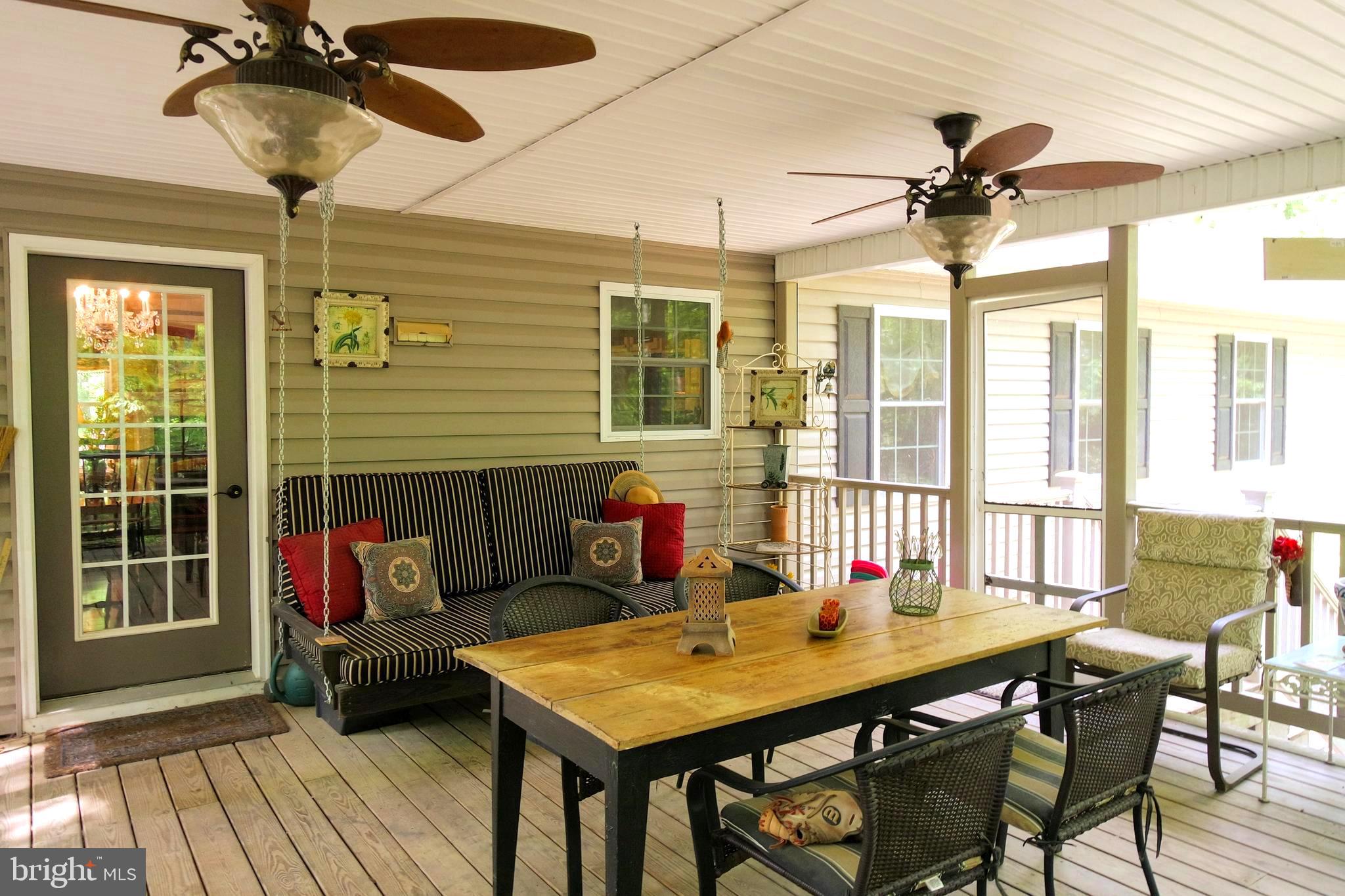 522 Orchard Road Mount Jackson, VA 22842 - Photo 60 of 65 Porch with bed swing