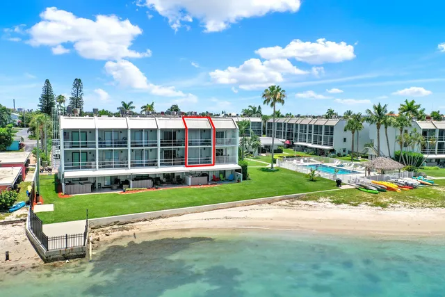 a view of a kids yard in front of a house