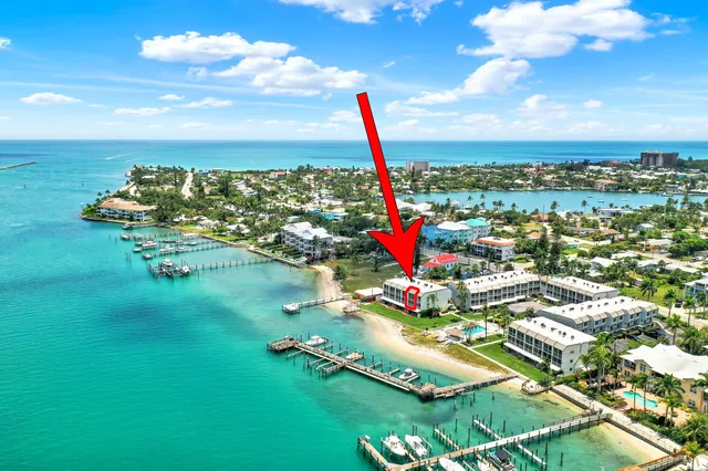 an aerial view of a with a big yard