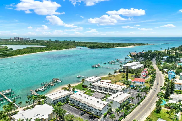 a view of a city with mountains in the background