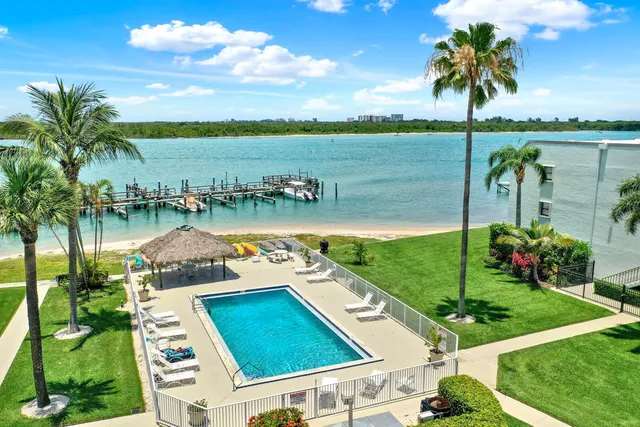 a view of a lake with a yard