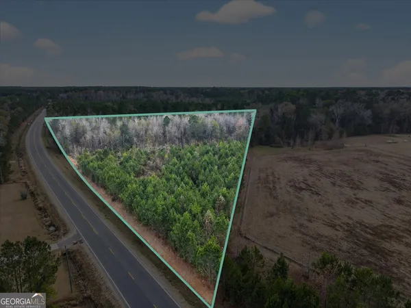 a view of a garden from a balcony