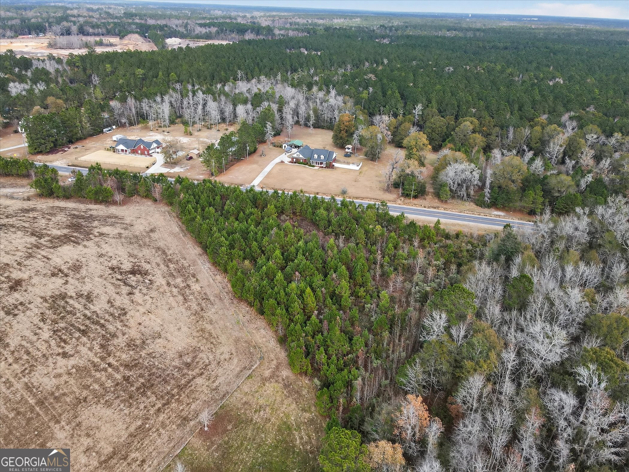 Lot 5 McCall Road Rincon, GA 31326 - Photo 4 of 9 a view of a lake with a city