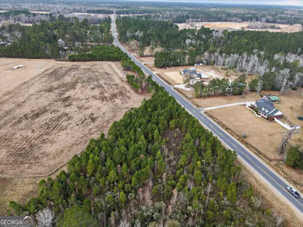 a view of a garden from a balcony