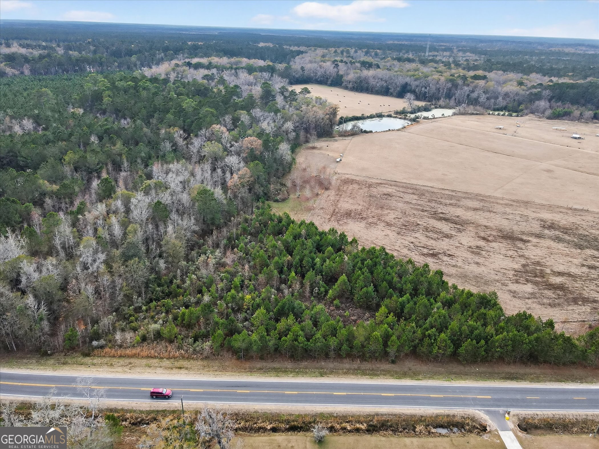 Lot 5 McCall Road Rincon, GA 31326 - Photo 8 of 9 an aerial view of beach and yard