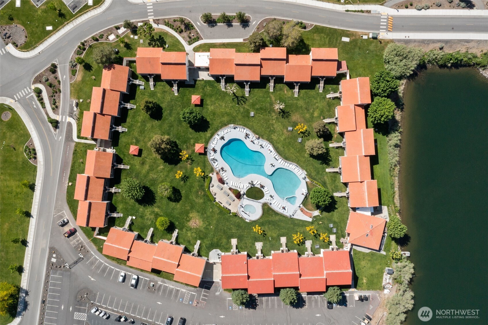 8903 Crescent Bar Road Northwest, Unit 101 Quincy, WA 98848 - Photo 7 of 40 an aerial view of multiple houses with yard