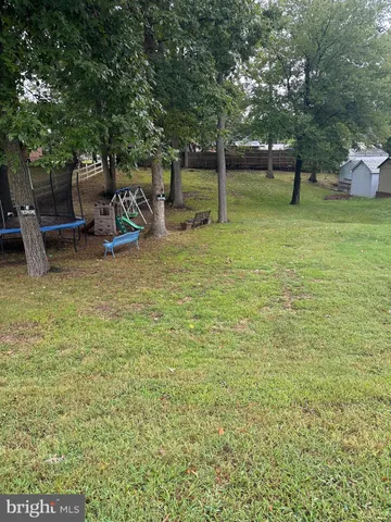 a view of a garden with a slide