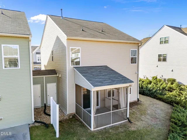 a view of backyard of a house