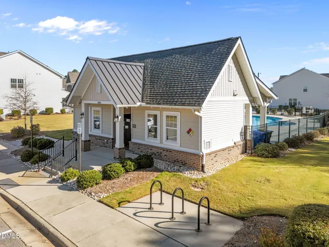 a view of a house with swimming pool