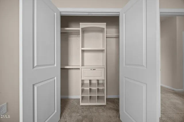 a view of an empty walk in closet