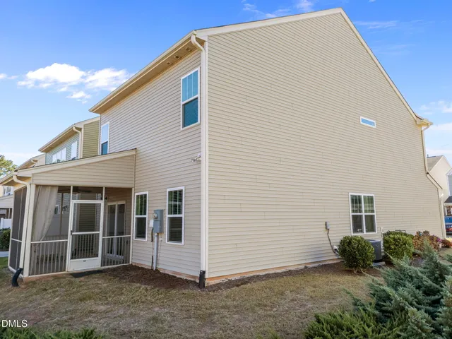 a view of a terrace with yard