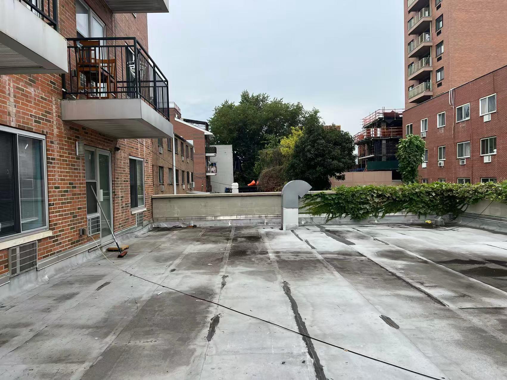 31-53 Linden Place, Unit 2E Queens, NY 11354 - Photo 5 of 7 a view of a building with a street