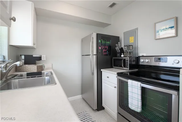 $575,000 | 620 Southeast 47th Street, Unit 14, Cape Coral, FL 33904