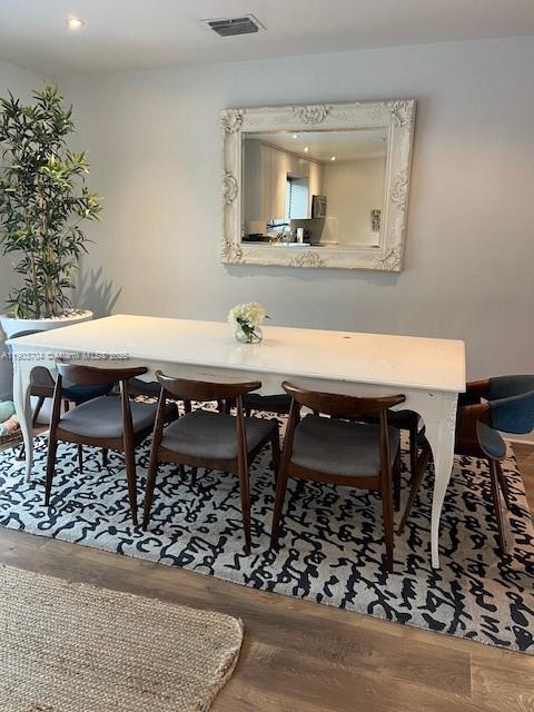 201 Northeast 48th Street Miami, FL 33137 - Photo 18 of 19 a view of a dining room with furniture and wooden floor