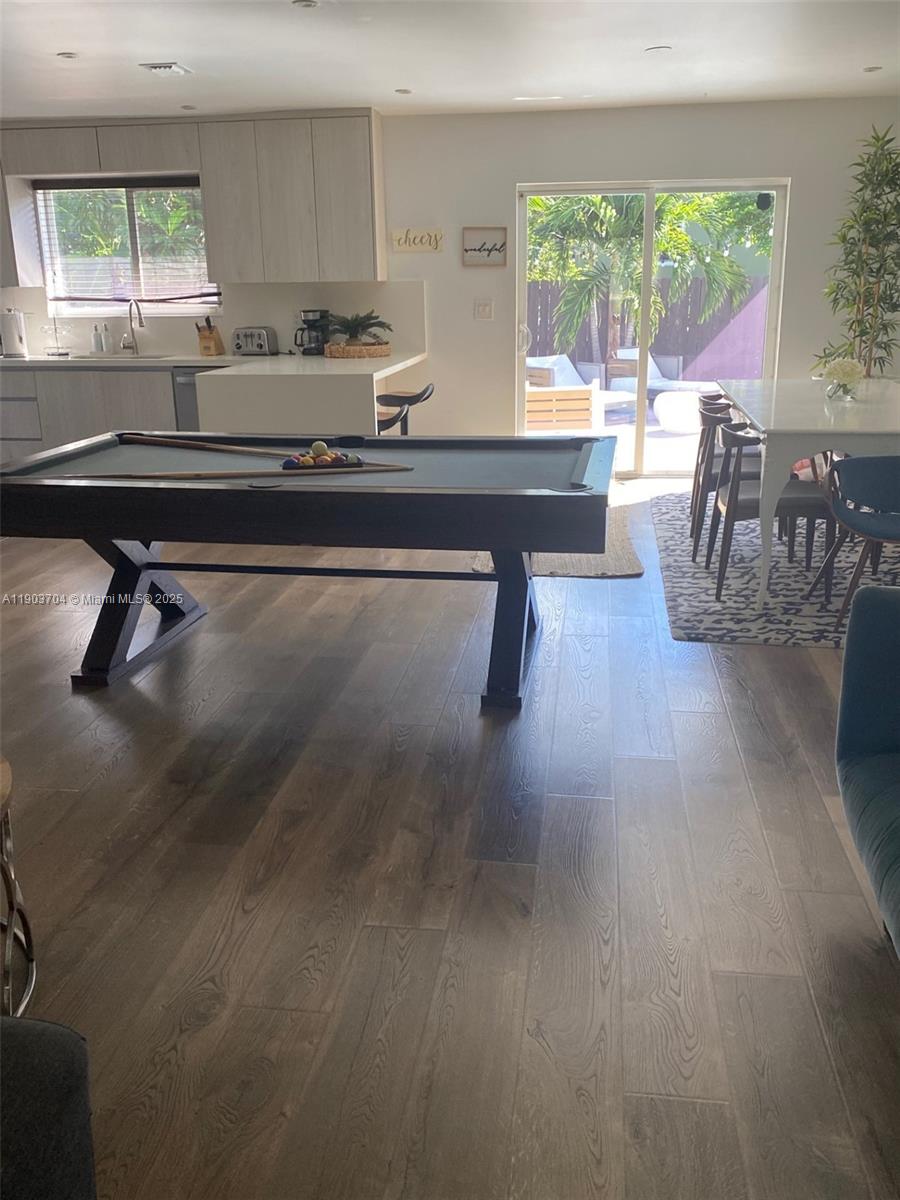 201 Northeast 48th Street Miami, FL 33137 - Photo 7 of 19 a living room with furniture a window and a table