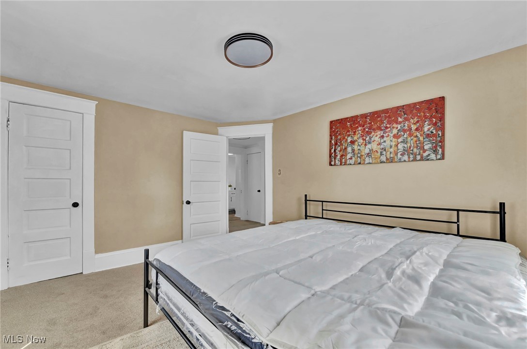 732 Carpenter Street Akron, OH 44310 - Photo 24 of 38 Bedroom featuring light carpet and baseboards